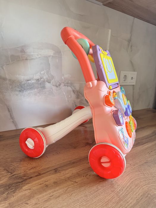 Дитяча каталка ходунки