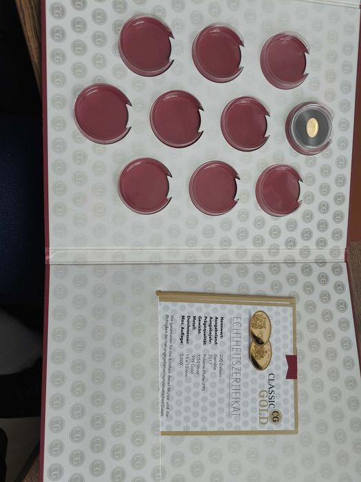 11 золотых монет с сертификатами + альбом