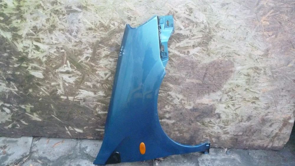 nissan tino błotnik prawy