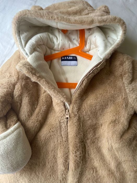 Новий теплющий комбінезон