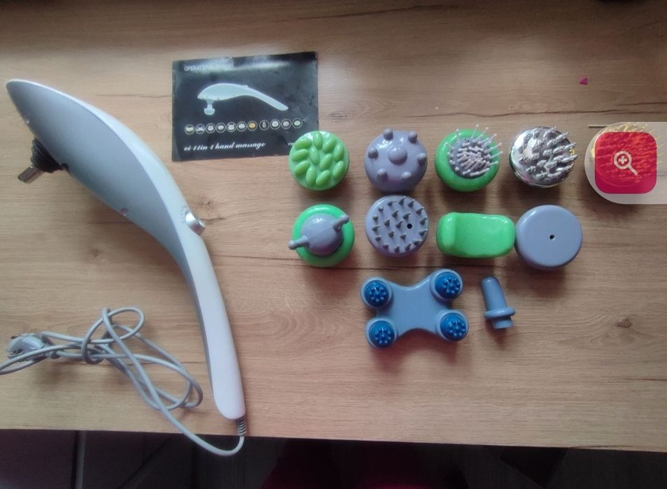 Masażer ręczny z zestawem nasadek