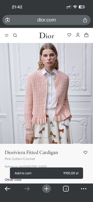 Sweterek dior nowy, sprzedaje bo za duzy