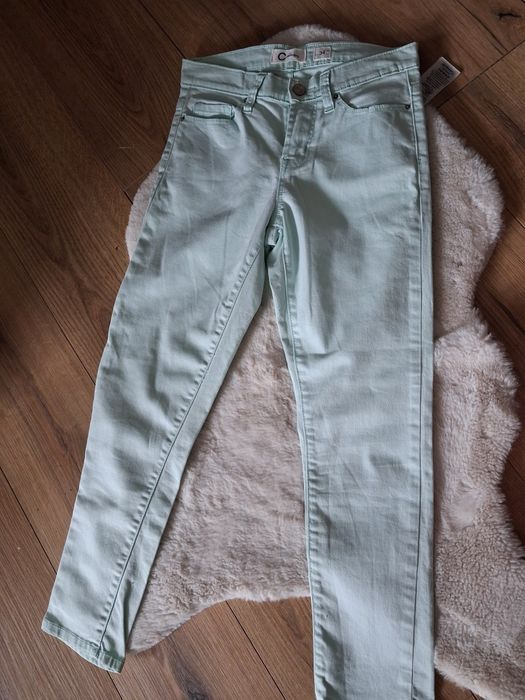 Wiosenne miętowe spodnie jeans rurki slim rozmiar xs. Cubus