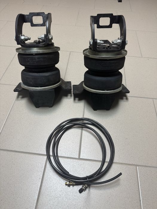 Пневмоподушки для посилення ресорної підвіски