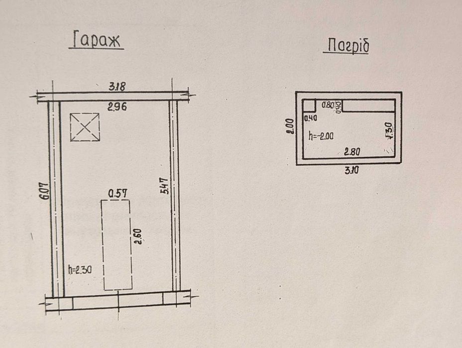 Капітальний гараж біля тролейбусного депо в кінці Правди