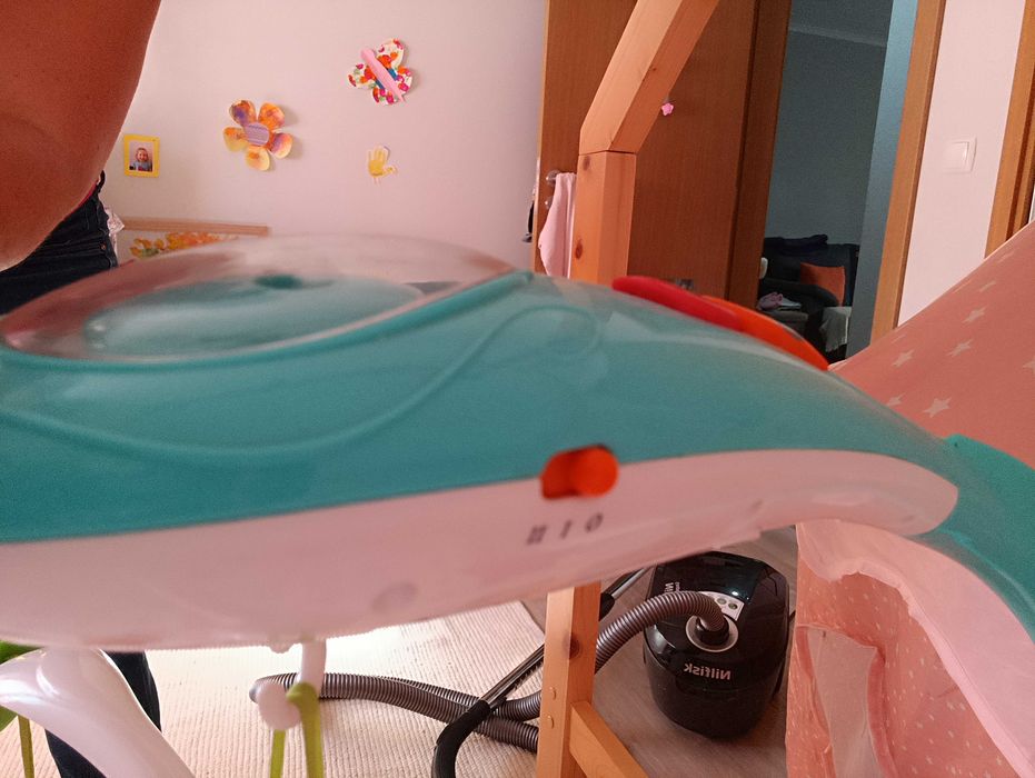 Móbile Chicco com projetor