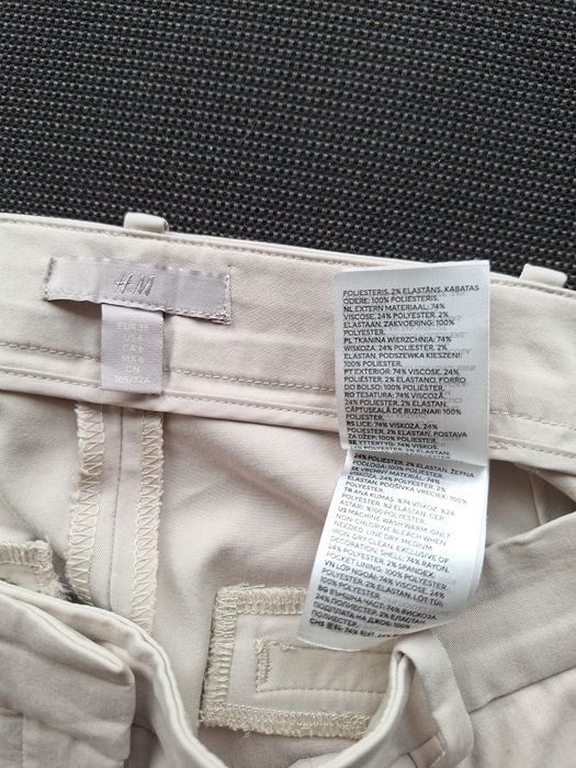 Beżowe spodnie HM 38 do pół łydki