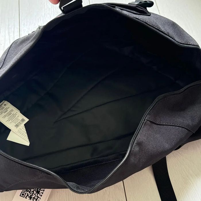 Сумка-слінг через плече Eastpak Sling 008 Black 15.5L,чорна