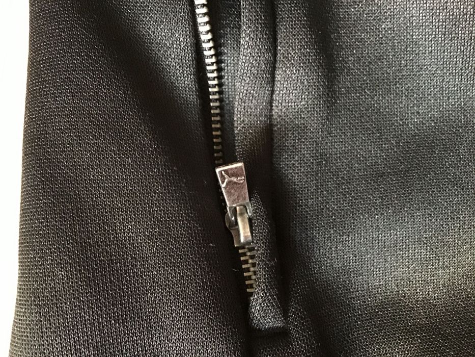 Puma czarna bluza z kieszeniami  rozmiar S/36
