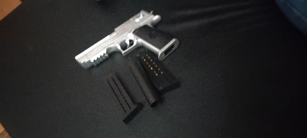 Arma de airsoft nova