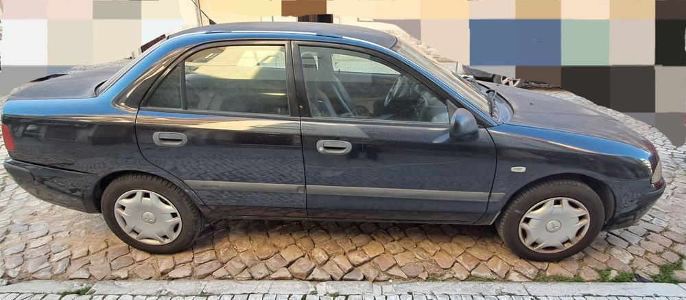 Viatura Mitsubishi Carisma 2003