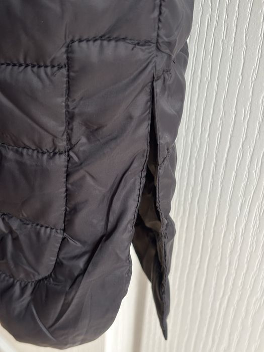 Piekne pikowany plaszczyk dlugi . Czarny Carry. Nowy bez metki. XL.