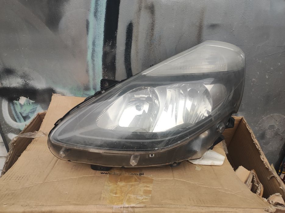 Lampa Clio 3 lift 09-12 lewa orginalna