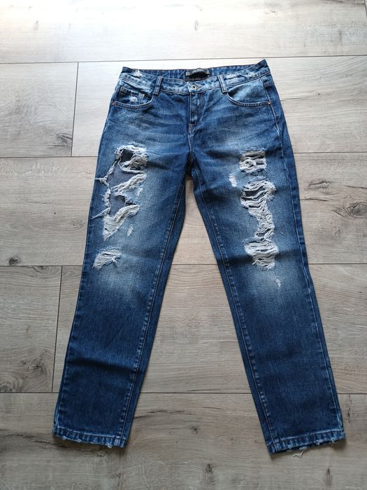 Spodnie jeansy z rozdarciami  Zara TRF r 36