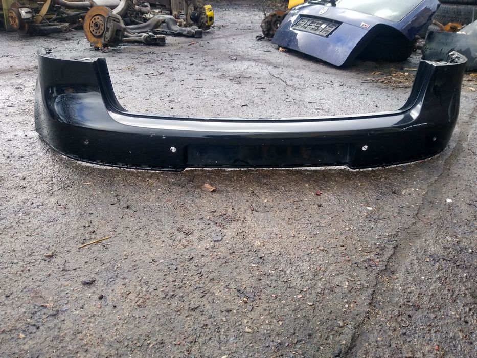 Zderzak tył VW Golf V HB PDC czarny oryginał