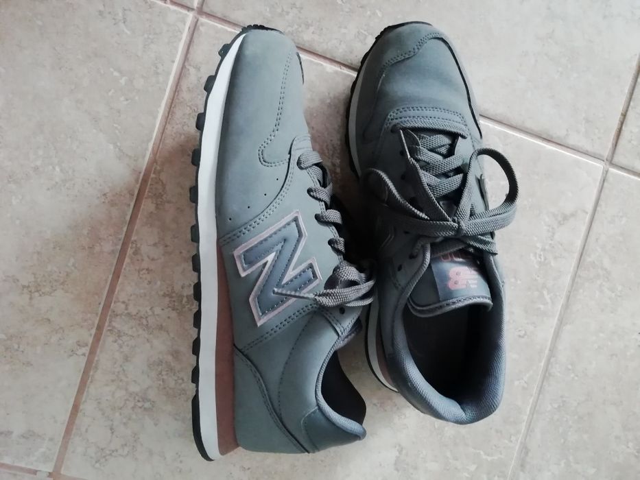 Ténis New Balance cinza