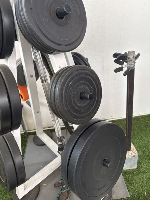 Barra Technogym Pro e discos
