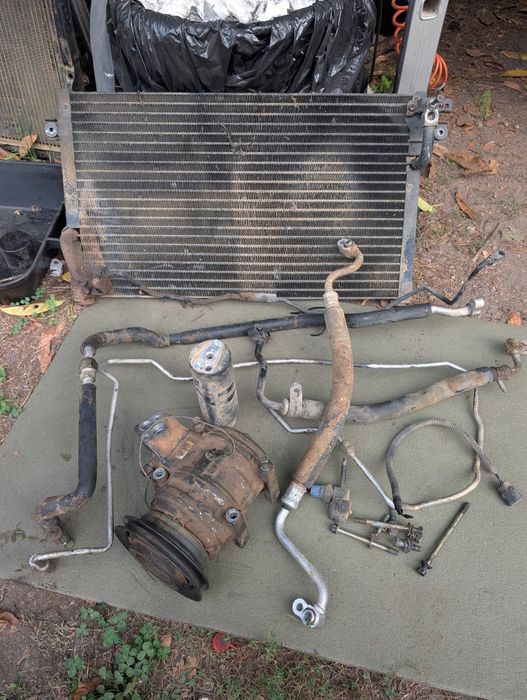 Radiador e compresssor do AC Mitsubishi Pajero 2