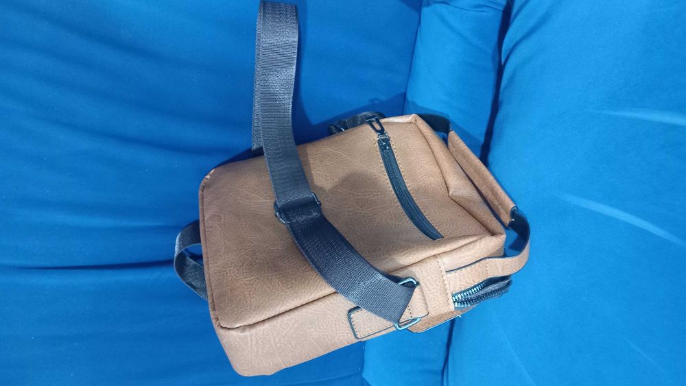 Mochila tira colo pele