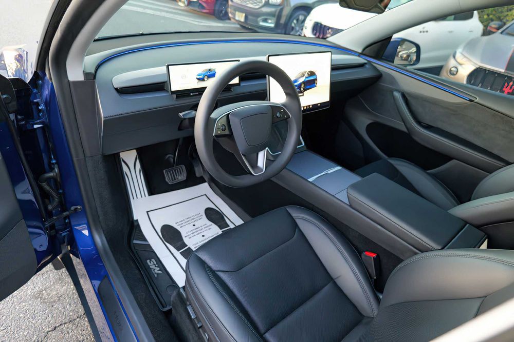 Tesla Model Y      2026