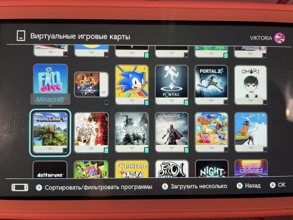 Nintendo Switch Lite рожевий + багато ігор