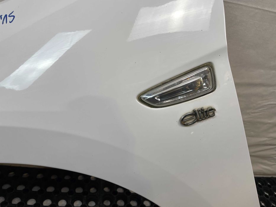 Błotnik przód przedni lewy opel astra v k kod lakieru: y40r 2015-