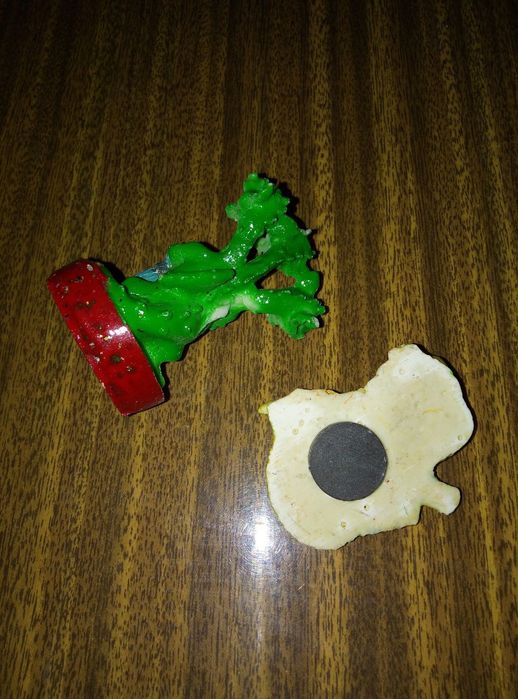 Фигурка зелёные драконы.