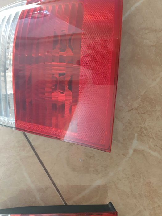 bmw e61 lampy tylne w błotniki przedlift