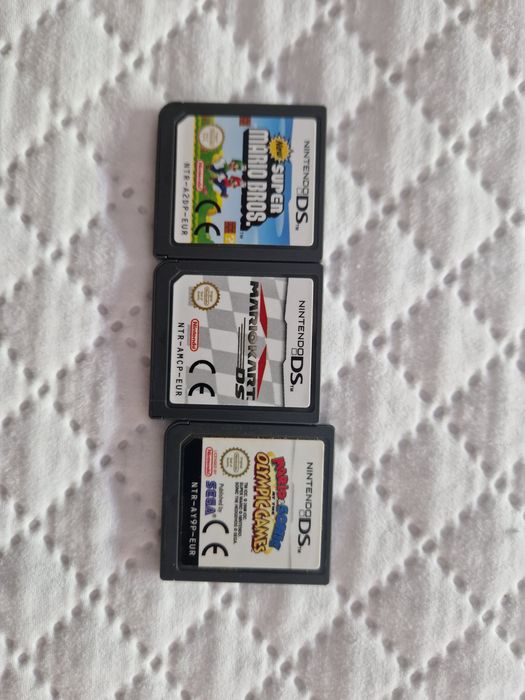 Nintendo DSi XL usado com 3 jogos, em bom estado