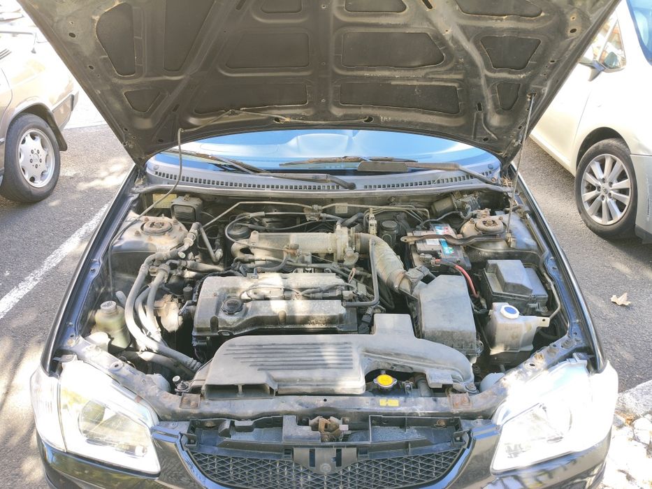 Vendo Mazda 323F com inspeção feita recentemente, feita em setembro de 2026.