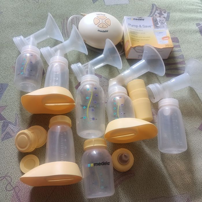 Молокоотсос Medela Swing б/у