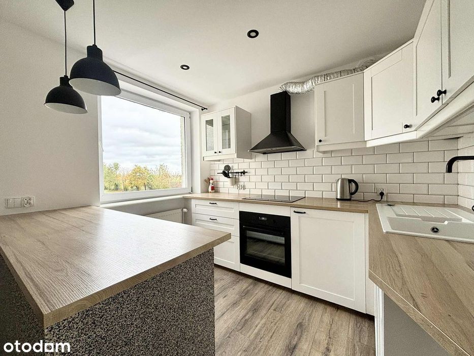 Przestronne mieszkanie z garażem i ogródkiem