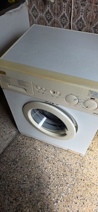 Máquina de lavar roupa antiga (urgente)