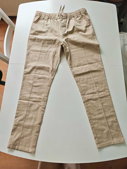 Spodnie bawełniane, beżowe Asos