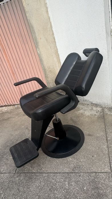Cadeira de barbeiro usada