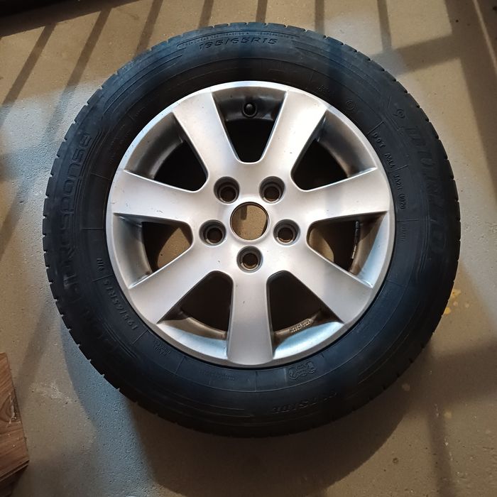 Felgi aluminiowe Dunlop opony letnie VW  golf plus Stojak  Felgi 15 alusy
