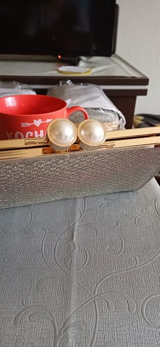 Srebrna elegancka kopertówka