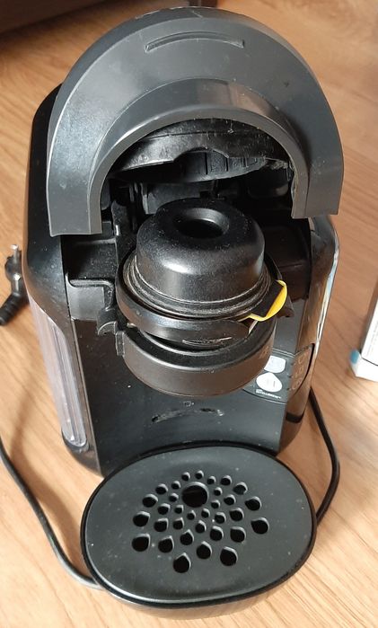 Ekspress kapsułkowy Bosch + uniwersalna kapsułka, filtry i kawa