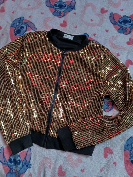 Bluza rozpinana /146 cekinowa w złotym kolorze stan bdb