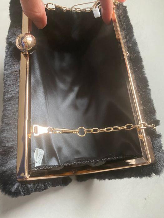 Clutch preta nova