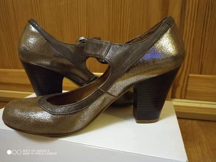 Złote pantofle Clarks
