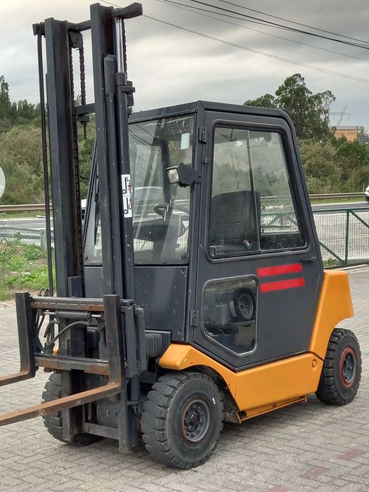 Empilhador Still Hybrid-Gás 2. Toneladas, deslocamento lateral de 2006