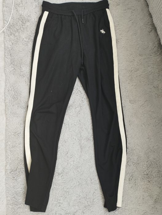 Spodnie M/L dresowe z lampasem eleganckie mucha