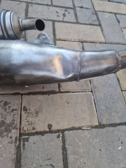 Вихлопна труба на діо 34 лео тт