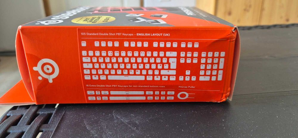 Teclado Corsair K100 RGB Layout UK + Pack Keycaps SteelSeries Prismcaps