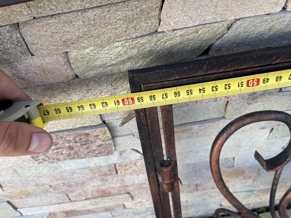 Кована камінна решітка