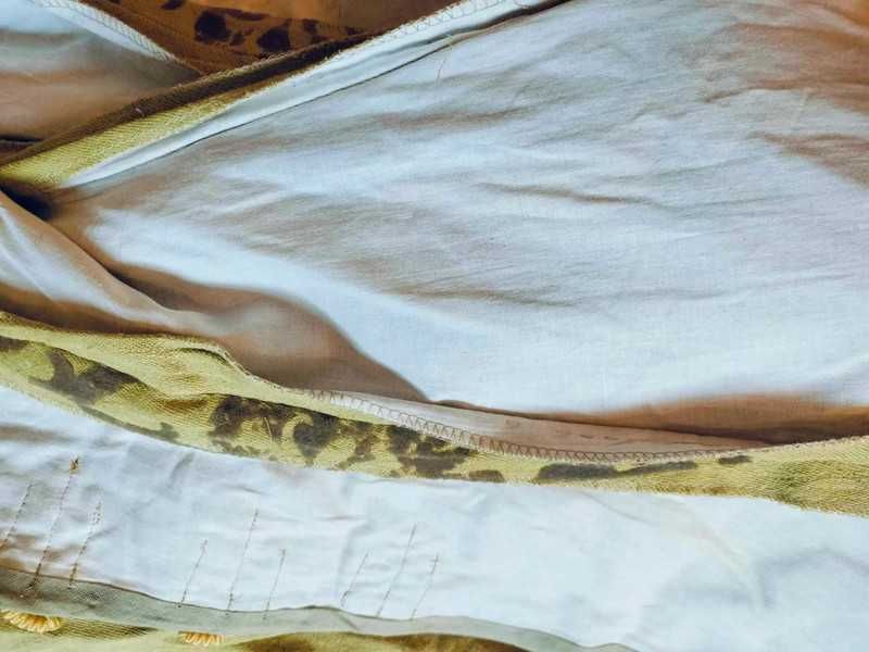 Spódnica i kaftan zielone z ornamentami