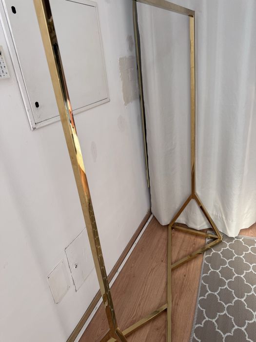 Charriot - expositor de roupas dourado