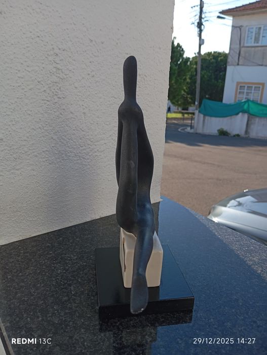 Estatueta lua nova436854411379363842