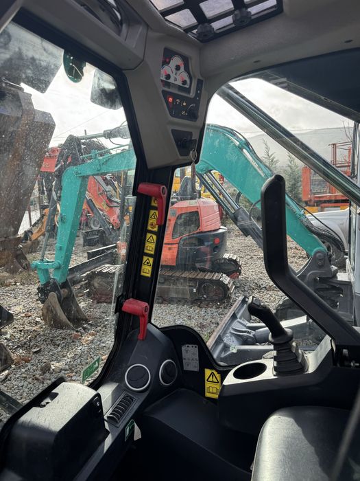 Mini pá carregadora jcb